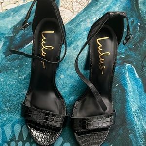 Black chunky faux snake heels
